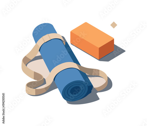 Minimal yoga practice gear with mat strap and block loosely arranged seen from a top-down angle, offset to the left third of a
