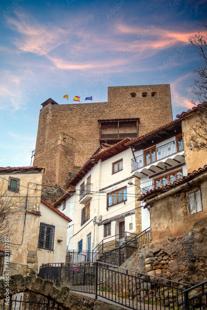 Fototapeta premium Castle overlooking the town of Alcalá de la Selva, Teruel, Aragon, Spain