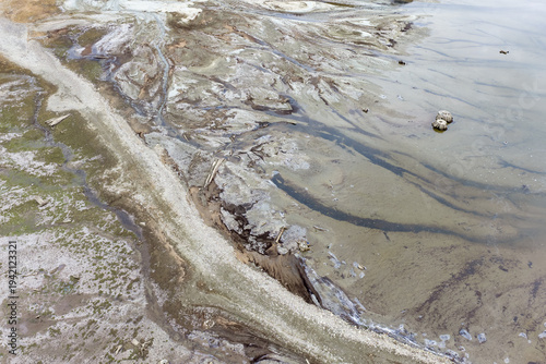 Aerial View Of Exposed Lakebed And Mudflats On A Low Shoreline In BC, Canada