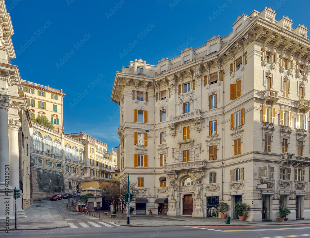 Fototapeta premium Genoa, Liguria, Italy - Palazzo Zuccarino-Cerutti in neoclassical Art Nouveau style in Via XX Settembre, with the Faculty of Education building in the background in via Foscolo