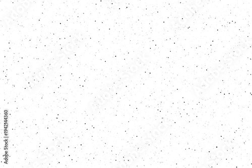 A multitude of tiny dark spots provides a speckled, high contrast pattern over a pure white background