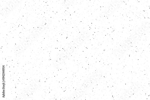 A vast expanse of tiny black points randomly distributed across a brilliant white background