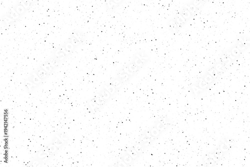 Scattered black dots on a clean white field create a subtle grunge effect or digital static