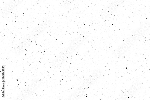 Subtle distressed surface with a uniform scattering of fine black particles against a pristine white field