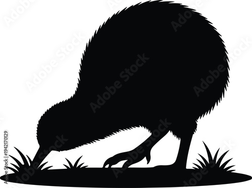 Vector kiwi bird foraging on grass silhouette design