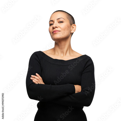 Confident Hispanic Woman with Shaved Head Posing with Crossed Arms, Cancer Survivor Empowerment