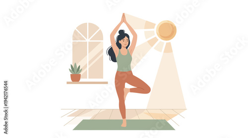 Woman practicing tree pose yoga indoors with sunlight shining through window