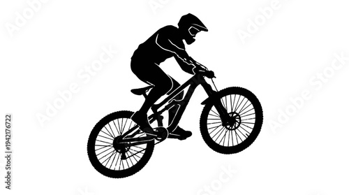 Dynamic silhouette of a mountain biker in action, performing an adventurous trick or jump on a bicycle