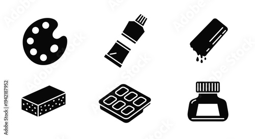 Artistic supplies including palette, paint tube, and ink bottle are arranged for.