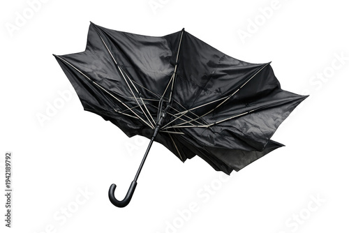 Blown out black umbrella damaged by strong wind