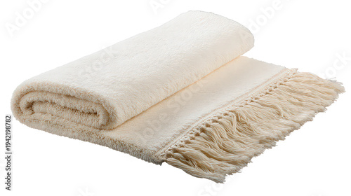 A neatly folded white towel with fringes on a black background