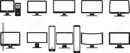 Various black and white computer monitors and desktop towers in a row