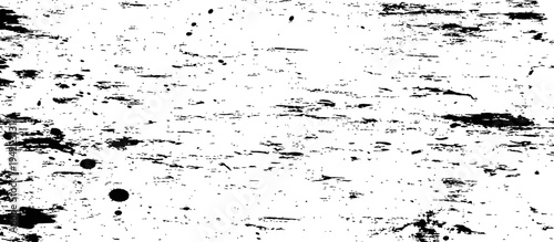 Distressed black and white grunge texture background with scattered paint splatters and worn surface effect