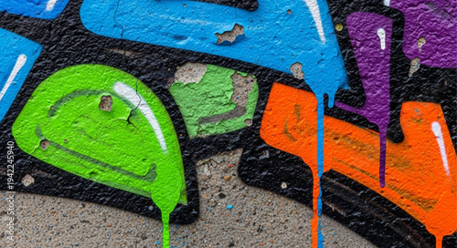 Colorful Spray Paint Graffiti Art on Wall Surface.