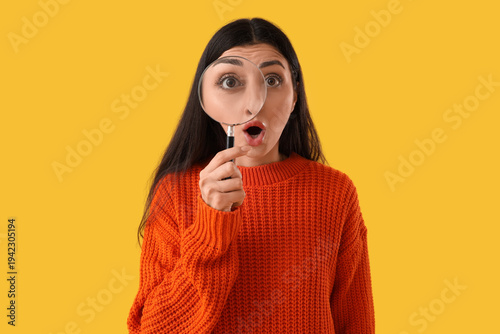 Shocked young woman with ma...