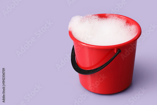 Plastic bucket with foam on...