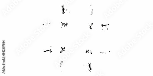 Abstract black ink blots resembling fragmented figures in a stark space