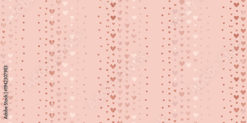 A soft pink background adorned with a scattered pattern of small hearts