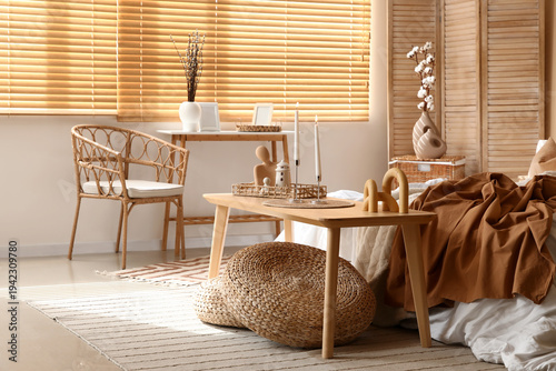 Interior of bedroom with ta...