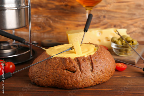 Cheese fondue in bread and ...