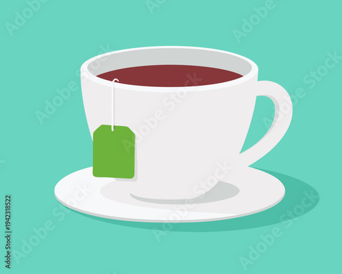 A white ceramic cup filled with dark tea and a green teabag