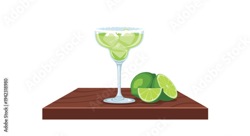 A salt-rimmed margarita glass with a green drink and ice, accompanied by whole and sliced limes, rests on a dark wooden surface against a white background.