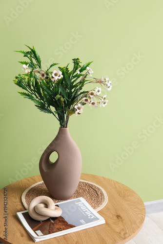 Vase with beautiful artific...