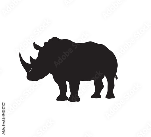 Black Silhouette of a Rhinoceros standing, isolated on a white background, representing wildlife and conservation efforts