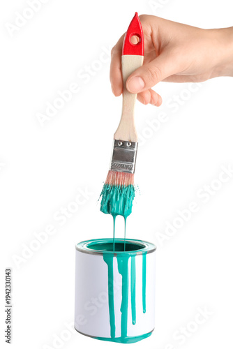 Female hand with can of tur...
