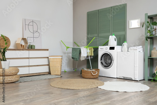 Interior of stylish laundry...