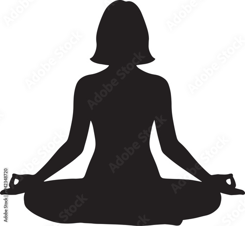 Young woman practicing yoga in lotus pose for meditation and mental wellness