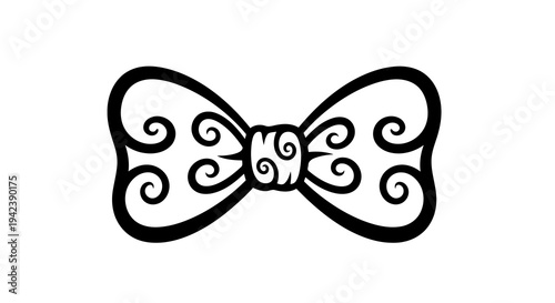 A black and white image of a decorative bow