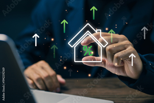Businessman analyzing real estate investment growth with house icon and financial percentage. Concept of property investment, mortgage rates, housing market growth, and real estate financial strategy.