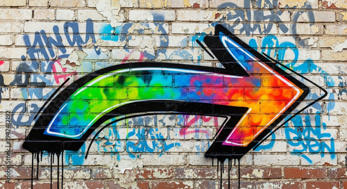 Colorful Arrow Graffiti Art on Brick Wall.