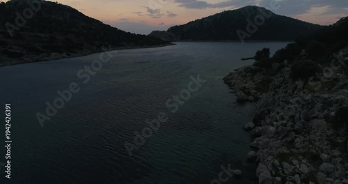 Cinematic drone footage of turquoise sea waves - serene ocean view from the air in 4K resolution.