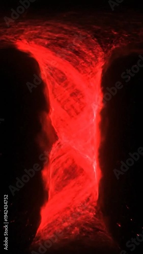 Fiery vortex of energy swirls in the darkness