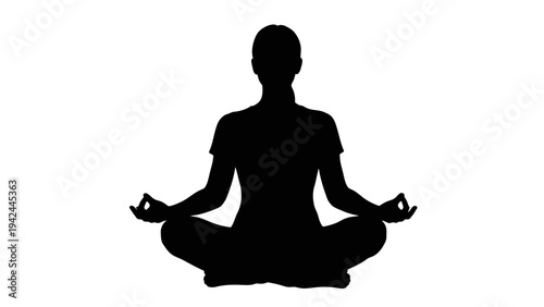 Person meditating in lotus position.