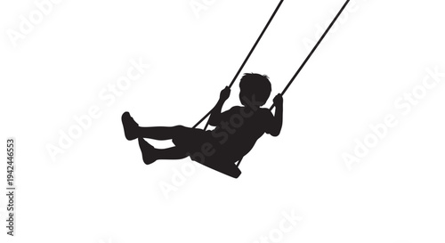 Child silhouette swinging joyfully on a playground swing