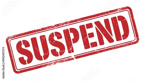 A rectangular, worn, red stamp boldly states 'suspend,' signifying a temporary or permanent discontinuation. high-quality
