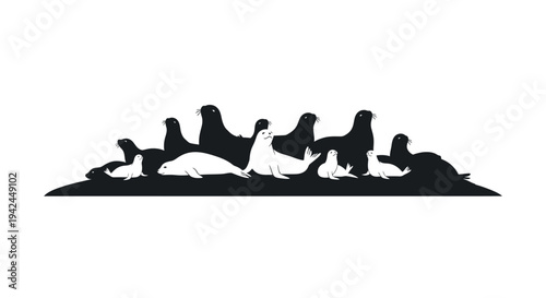 Colony of seals and pups resting on arctic shore