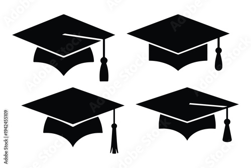 Black graduation caps with tassels in four different positions
