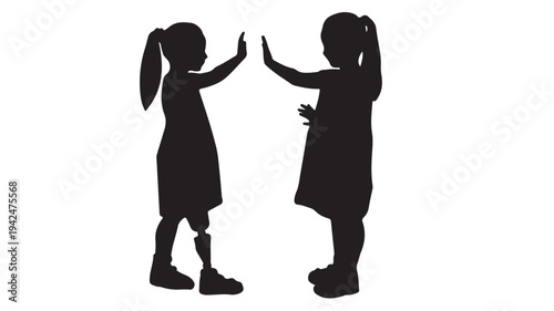 Children silhouettes with a prosthetic leg giving a high five with a clean white background and a lighthearted interaction.
