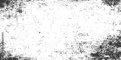 Abstract grunge background featuring black ink splashes and wet paint drops with a dirty film texture on an old glass wall pattern