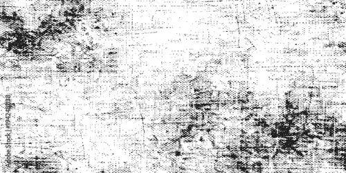 An antique aged gray concrete wall surface with a dirty grunge texture and rough vintage paint patterns creates a textured dark stone backdrop