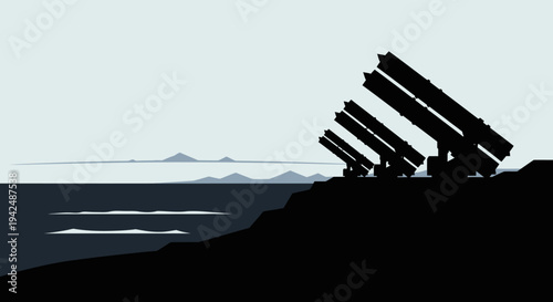 Coastal missile defense system on cliff edge with ocean view