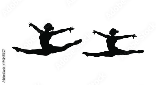 Two dancers in mid air split poses a striking black silhouette