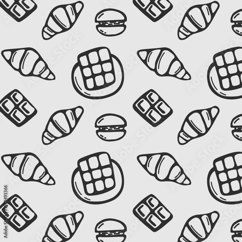 Seamless pattern with hand drawn cafe desserts including croissants, waffles and chocolate. Cute bakery and coffee themed doodle background for packaging, textile and menu design.