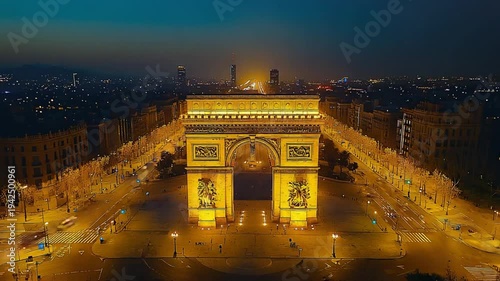 aerial drone shot of arch of triumph in barcelona spain at night timelapse conceptual