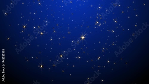 Shinny glowing Gold glitter falling on a black royal blue background