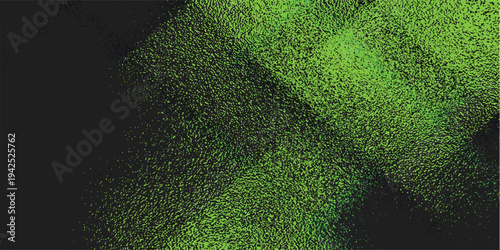 Close-up aerial view of lush green grass texture with dark shadows.